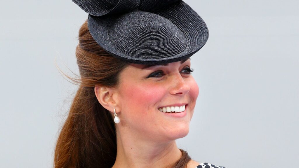 Kate Middletons striking spin on pregnancy dressing in a mini dress