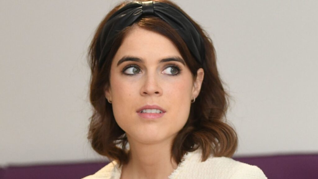 Princess Eugenie is radiant in silky slip skirt and knee high boots for touching outing