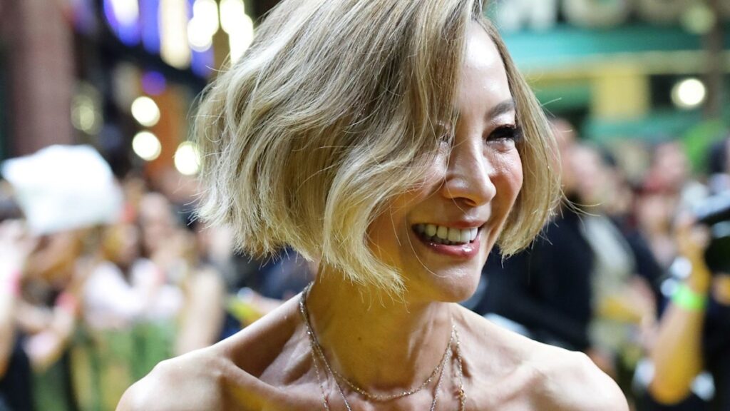 Michelle Yeoh 63 reveals toned figure in plunging neckline and see through bubble dress for Wicked event