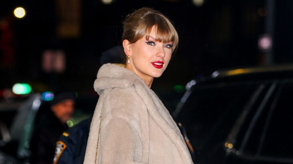 Taylor Swift Performs Aunt Tay Duties in a Luxe Winter Coat of Many Fall Colors
