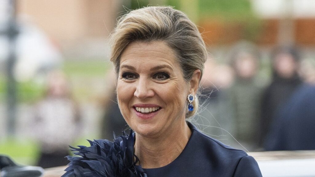 How to style satin in your 50s Queen Maximas top has a feathered detail that stole the show