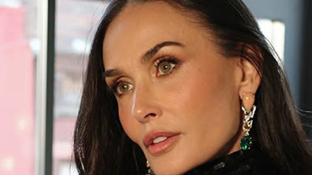 Demi Moore cuts a liquid silhouette in slinky Victoria Beckham dress