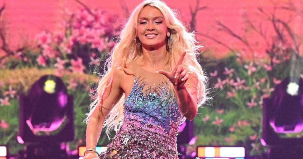 GettyImages2253650113jpg | New Top Model Zara Larsson Rides a Dolphin in Super Sparkly Micro Skirt