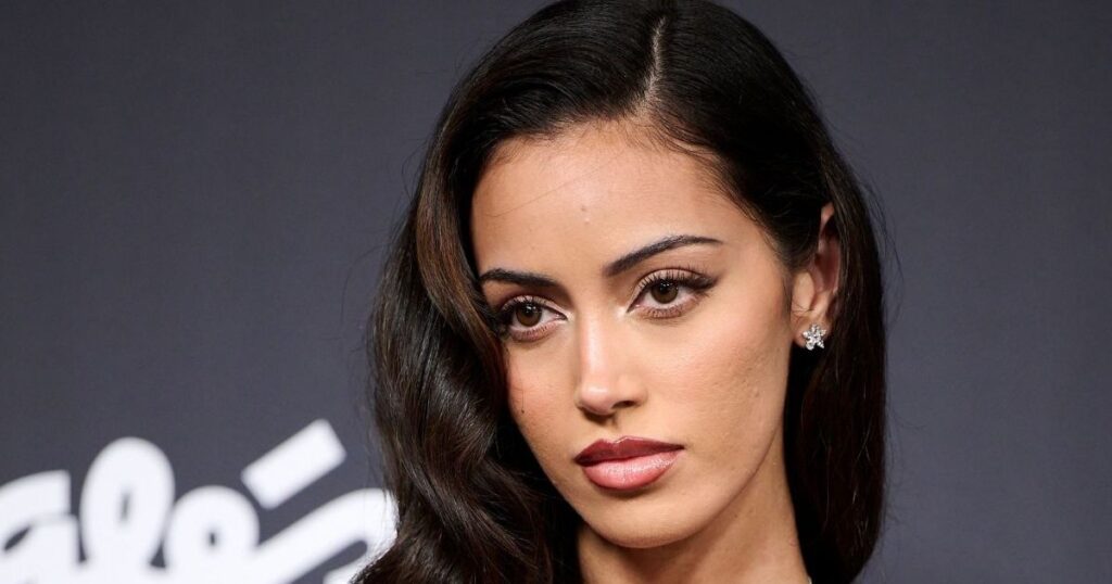 Cindy Kimberly Turns Heads in Brown Mini Dress