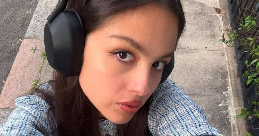 OliviaRodrigo2jpg | New Top Model Olivia Rodrigo Layers an Open Jacket Over a Tie Up Bikini Top for British Vogue