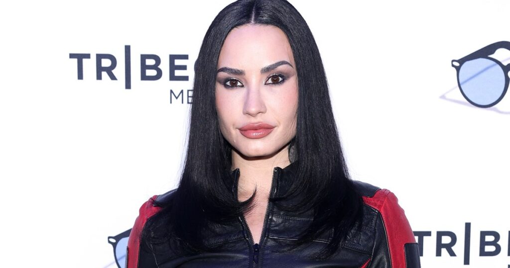 Demi Lovato Turns Heads With Thong Peek in Dramatic High Slit Look