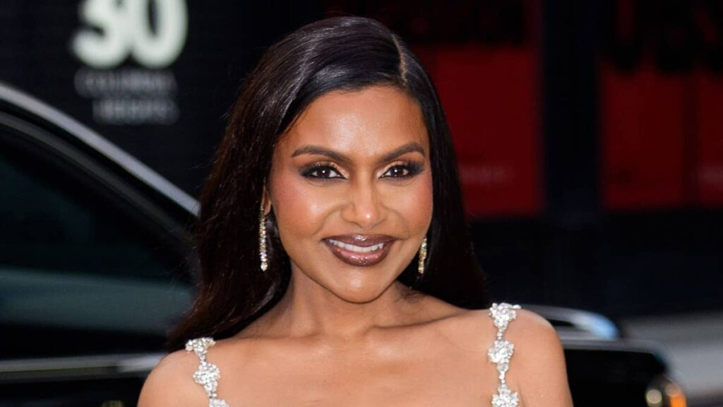 Mindy Kaling highlights tiny waist in glittery gold gown after 40lbs weight loss transformation