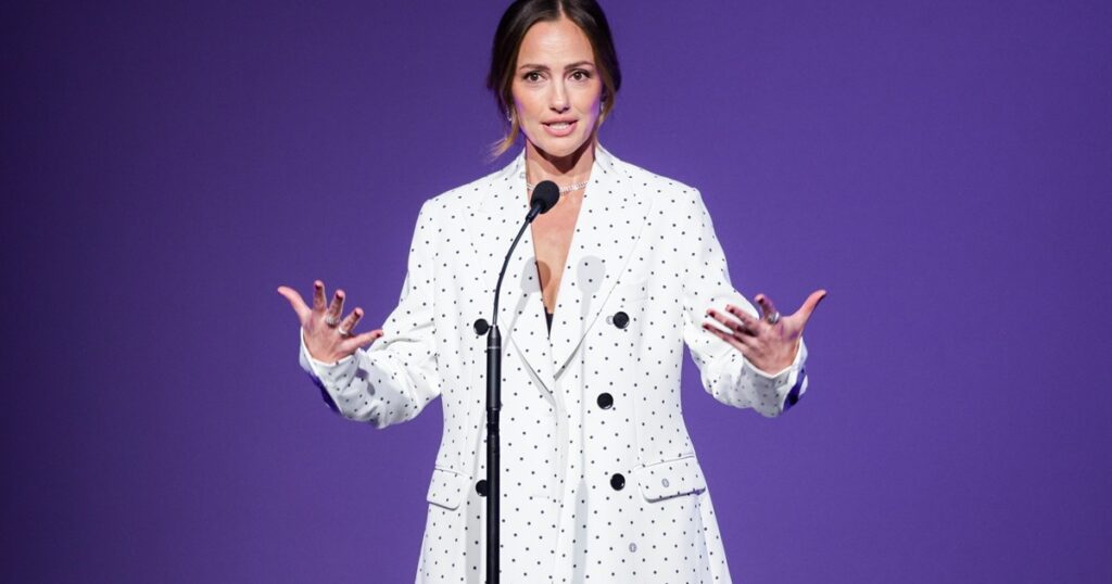 Minka Kellys Open Jacket Look Puts Her Racy Bralette on Display