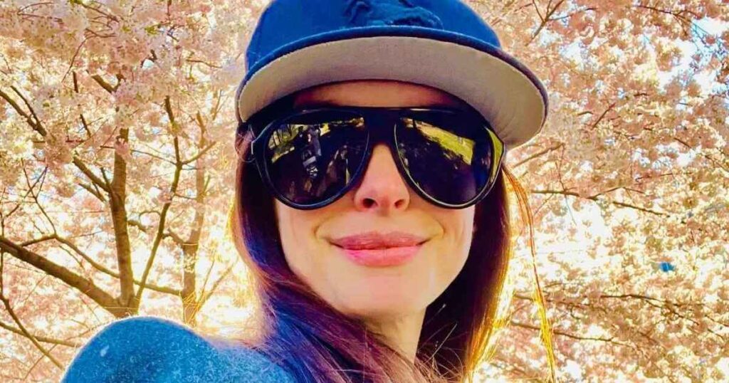 Anne Hathaway Nearly Spills Out of Plunging Bottega Veneta Top for Vogue