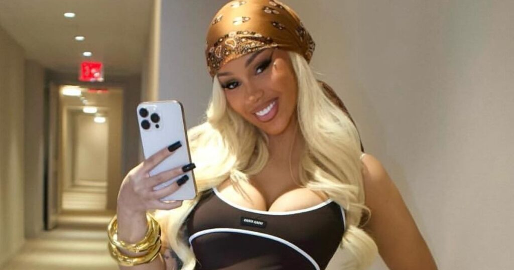 Cardi Bs Plunging Top Takes Her Skin Baring Style to Another Level
