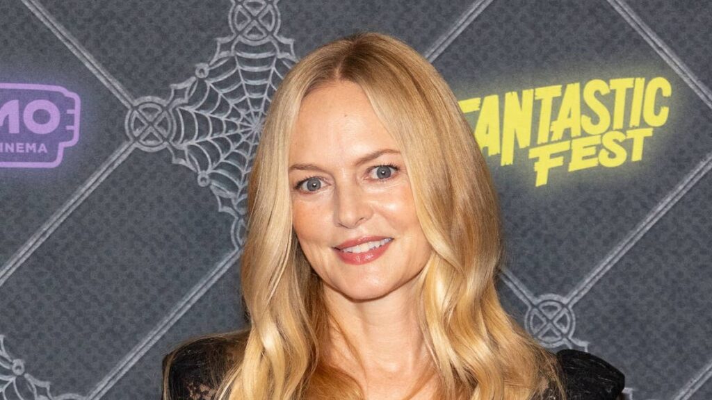Heather Graham 56 shows off incredible figure in sheer gothic dress