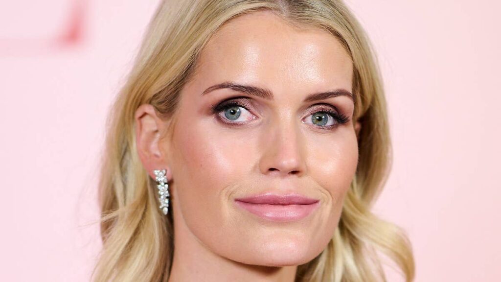 Princess Dianas niece Lady Kitty Spencer revamps the naked dress with visible lingerie