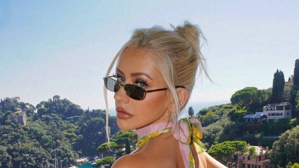 Christina Aguilera shows off incredible figure in backless top on romantic Italian vacation with longtime fiancé